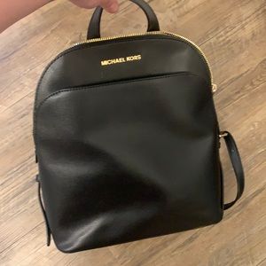 Michael Kors backpack purse.